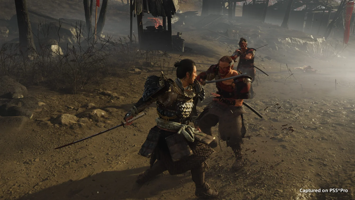 Atsu fighting a group of enemies in a courtyard