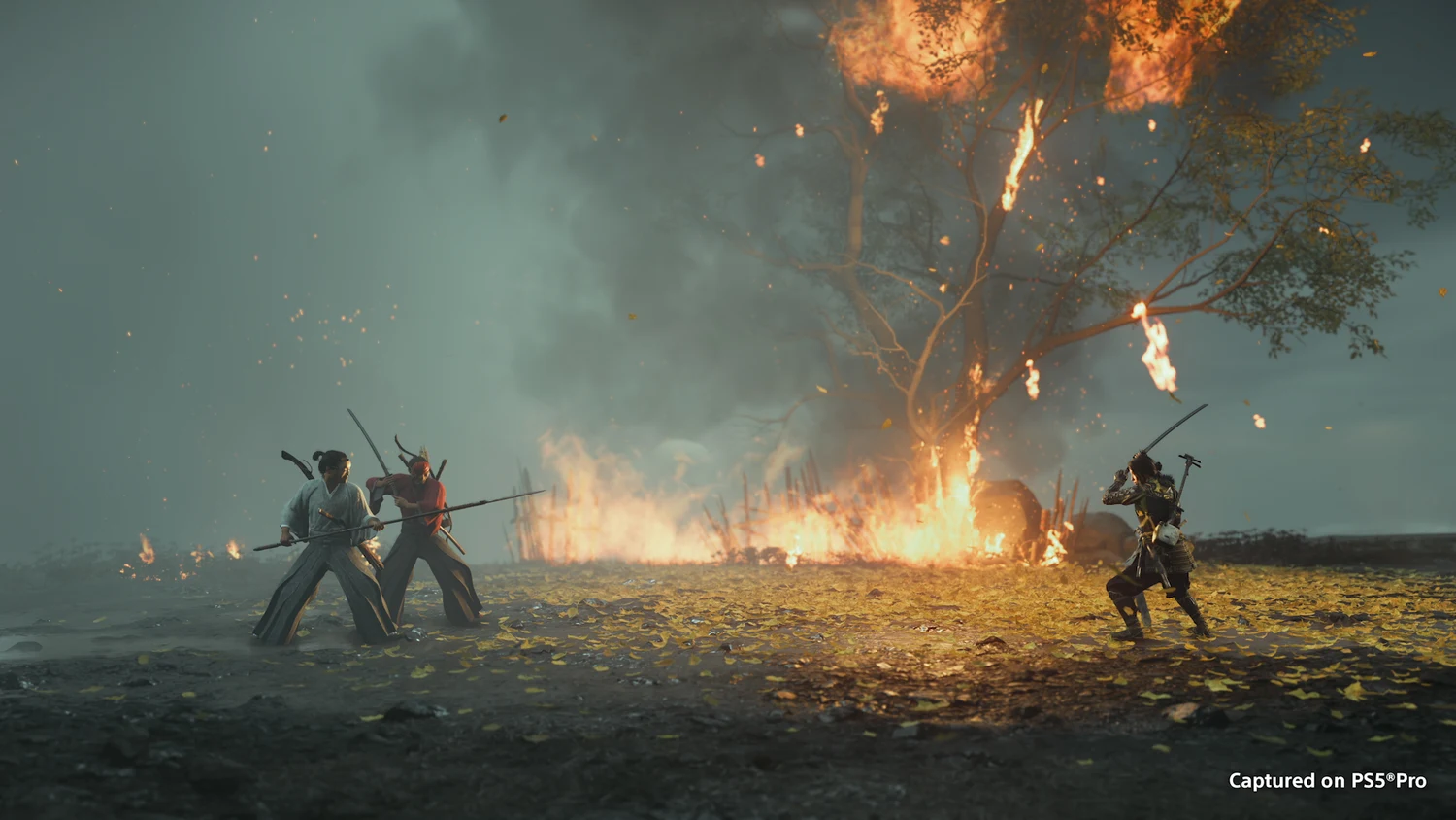 Atsu fighting enemies beside a burning tree in an official Most Wanted screenshot