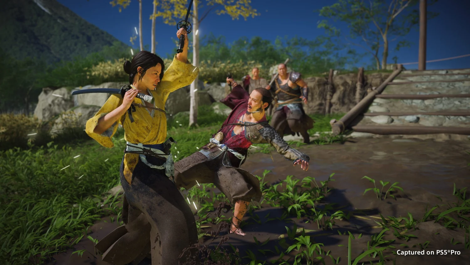 Atsu fighting enemies outside a building