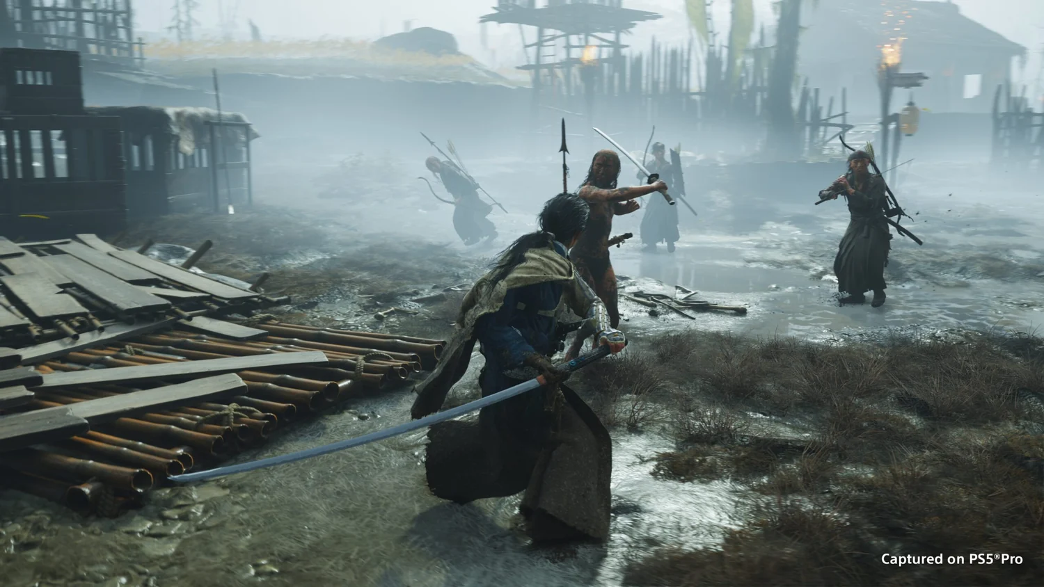 A sword fight on wooden walkways in a misty settlement